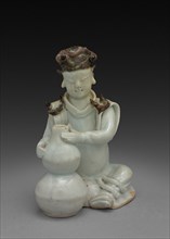 Potter Seated with Double Gourd Vase:  Ch'ing-pai Ware, 14th Century. China, Yuan dynasty