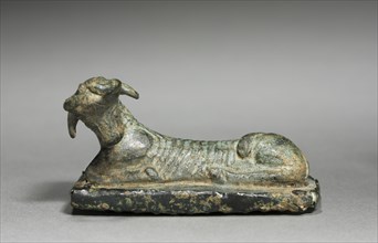 Recumbent Animal on Grater, 700-500 BC. Greece or Asia Minor, 8th-6th Century BC. Bronze with iron