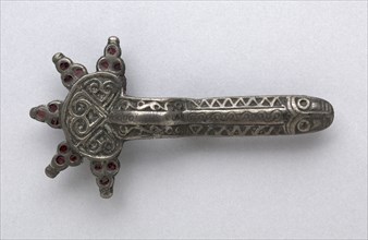 Fibula, 500s. Frankish, Migration period, 6th century. Silver with garnets; overall: 11 x 6 x 1.6