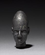 Head of Foreign God or Prince, c. 1320 BC. Egypt or Syria, late Dynasty XVIII. Black magnetite;