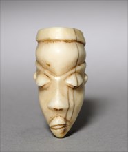 Pendant, late 1800s. Central Africa, Democratic Republic of the Congo, Pende, 19th century. Ivory;