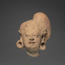 Female Head, Majapahit Dynasty (1293-1478). Eastern Java, Majapahit Dynasty (1293-1478).