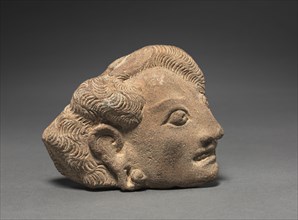 Yakshini's Head, c. 11th Century. Java, Eastern Javanese Period. Terracotta; overall: 10.1 x 11.4