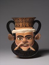 Janiform Kantharos, c. 470-460 BC. Greece, Athens, 5th Century BC. Molded earthenware with slip