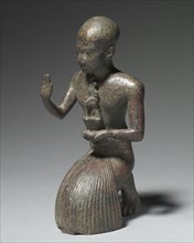 Statuette of a Kneeling Priest, 1186-1069 BC. Egypt, New Kingdom, Dynasty 20, 1279-1213 BC.