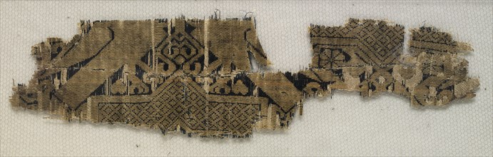 Textile Fragment with Portions of Eight-Pointed Star and Birds, 11th-12th century. Syria, Ayyubid