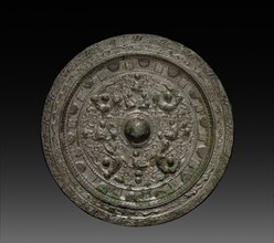 Mirror with Xiwangmu, c. 317-400. China, early Six Dynasties Period (317-581). Bronze; diameter: 18