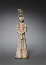 Court Lady with Tall Headdress:  Tomb Figurine, c. 700-750. Norht China, Tang dynasty (618-907).