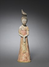 Court Lady with High Chignon, c. 700-750. North China, Tang dynasty (618-907). Earthenware with