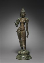 Goddess Holding a Lotus, c. 950. South India, Tamil Nadu, Chola period (900-13th Century). Bronze;