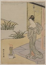 Young Woman Looking at a Pot of Pinks, c. 1767. Suzuki Harunobu (Japanese, 1724-1770). Color