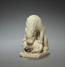 Lion Devouring a Lamb, early 700s. North China, Tang dynasty (618-907). White marble; overall: 14 x