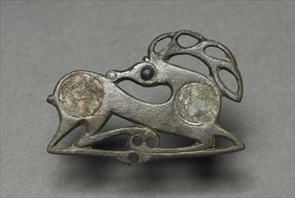 Fibula in the Form of a Recumbent Stag, c. 400. Northeastern Europe, 5th century. Bronze with glass