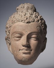 Head of Buddha, 700s. India, Kashmir, Akhnur school, 8th century. Clay, accidentally burned;