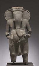 Ganesha, 600s. Cambodia, Pre-Angkorean period (600-802). Sandstone; overall: 122 x 58.7 x 23.8 cm