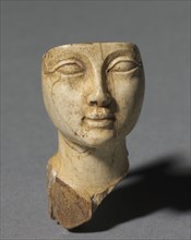 Face from a Cosmetic Spoon, 1391-1353 BC. Egypt, New Kingdom, Dyansty 18 (1540-1296 BC), reign of