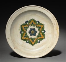 Footed Plate with Floral Medallion, early 700s. China, Tang dynasty (618-907). Glazed earthenware