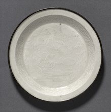 Dish with Ducks in Lotus Pond:  Ding Ware, 12th Century. China, Hebei province, Chuyang xian, Jin