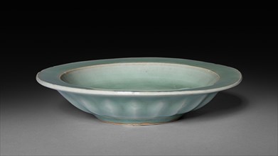 Dish with Two Fish in Relief:  Longquan Ware, early 14th Century. China, Zhejiang province, Yuan