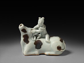 Buffalo with Rider:  Qingbai Ware, early 14th Century. China, Jiangxi province, Jingdezhen kilns,