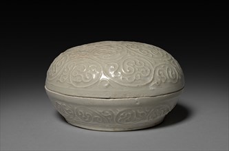 Round Covered Box with Floral Scrolls in Relief:  Qingbai type Ware, 14th Century. China, Fujian
