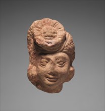Miniature Head of a Bodhisattva, 1st Century. India, Mathura, early Kushan Period (1st century-320)