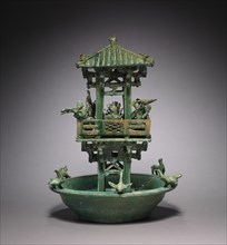 Watchtower, 25-220. China, Eastern Han dynasty (25-220). Earthenware with lead glaze; diameter: 39