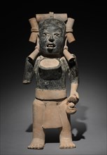 Standing Male Figure, 300-900. Mexico, Gulf Coast, 4th-10th Century. Earthenware, asphalt and resin