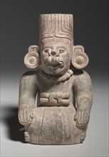 Urn Figure, c. 200-500. Mexico, Oaxaca, Zapotec. Earthenware; overall: 26.1 x 16.3 x 16.3 cm (10