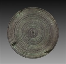 Dongson Drum Top, 300-400. Southeast Asia, Thailand, 4th - 5th century. Bronze