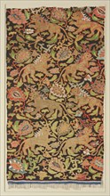 Tapestry with golden lions and palmettes, 1200s or earlier. Central Asia. Silk, gold thread;