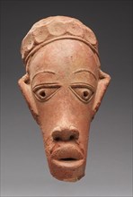 Head, 600 BC-AD 250. Guinea Coast, Nigeria, Nok region, 7th century BC-3rd century AD. Terracotta;