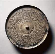 Mirror with Serpentine Interlaces, early 5th-late 3rd century BC. China, Eastern Zhou dynasty