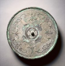 Mirror with Double Quatrefoils, Dragons, and Phoenixes, 3rd century BC. China, Eastern Zhou dynasty