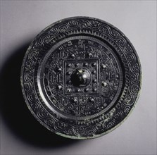TLV Mirror with Multiple Nipples, 1st century. China, Xin dynasty (9-23). Bronze; diameter: 16.3 cm