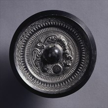 Mirror with a Coiling Dragon, 3rd Century. China, Three Kingdoms (221-280). Bronze; diameter: 9.9