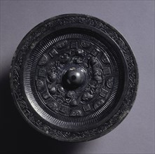 Mirror with Auspicious Animals Surrounded by Rings of Squares and Semicircles, late 2nd century.