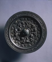 Mirror with Deities and Animals Surrounded by Rings of Squares and Semicircles, late 2nd century.