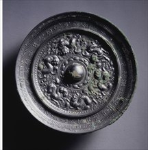 Mirror with Three Pairs of Pixie around a Loti-form Knob, mid 600s . China, Tang dynasty (618-907).