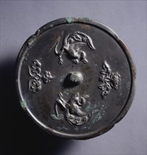 Lobed Mirror with Paired Phoenixes and Floral Displays, 8th century. China, Tang dynasty (618-907).