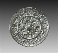 Animal-and-Grape Mirror, late 600s. China, Tang dynasty (618-907). Bronze; diameter: 14.8 cm (5