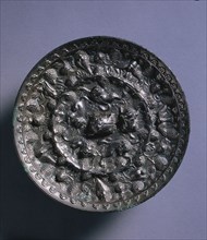 Animal-and-Grape Mirror with a Variety of Birds, late 600s. China, Tang dynasty (618-907). Bronze;
