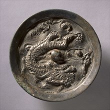 Dragon Mirror, mid 14th Century - mid 17th Century. China, Ming dynasty (1368-1644). Bronze;