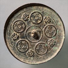 Mirror Featuring Dading Coins, c. 1178-1234. China, Jin dynasty (1115-1234). Bronze; diameter: 11.9