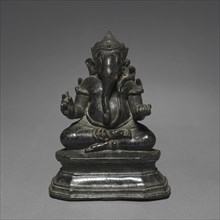 Seated Two-armed Ganesa, late 12th-early 13th Century. Cambodia, Angkor Wat Period. Bronze;