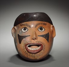 Severed Head Effigy Vessel, c. 100-350. Peru, South Coast, Nasca. Earthenware with colored slips;