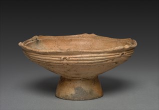 Pedestalled Dish, c. 1000 - 500 BC. Japan, late Jomon era. Burnished earthenware with carved and