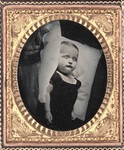 Post-Mortem on Pillow, Vertical, c. 1850. Unidentified Photographer. Ambrotype, tinted, sixth