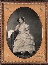 Young Woman in Bloomers, c. 1855. Unidentified Photographer. Daguerreotype, tinted and gilted