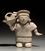 Standing Female with Basket, 600-1000. Mesoamerica, Veracruz, Nopiloa style, 7th-10th century.